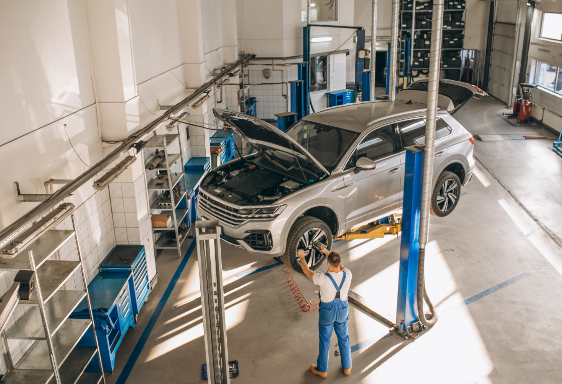 Mechanic Checking Car