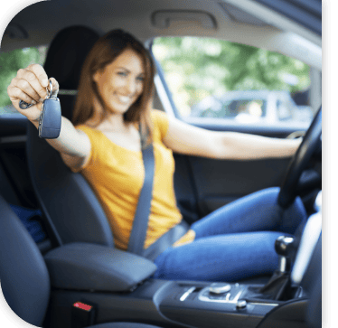 Customer receiving the keys to a used vehicle